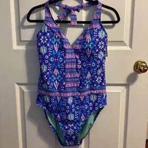 NEW with tags. One piece bathing suit. Ladies 14
